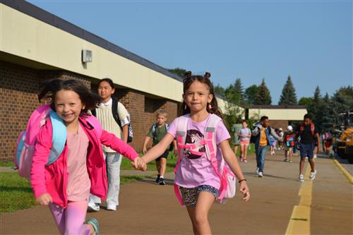 Students run into school